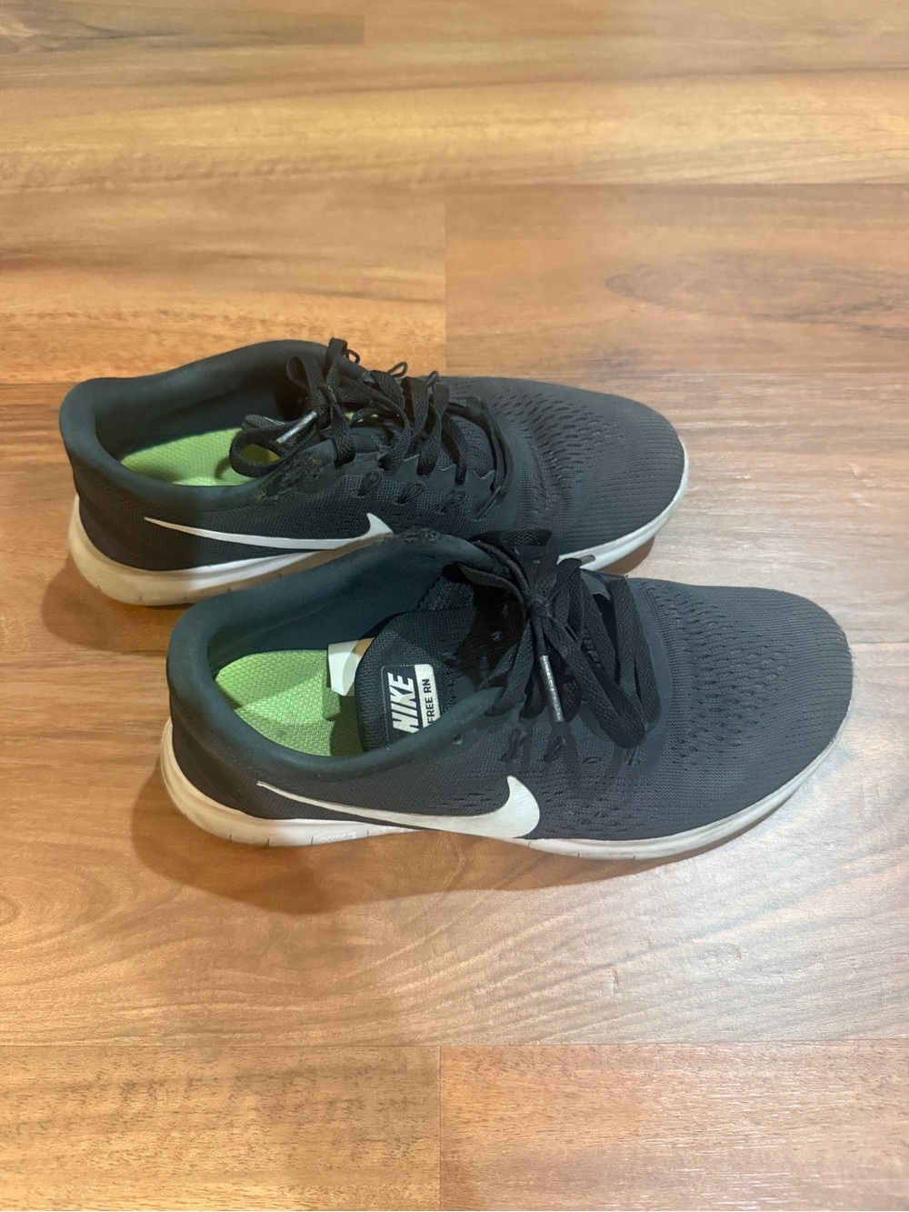 women’s nike free run shoes black and grey. 1 pair for $25 or both for $40